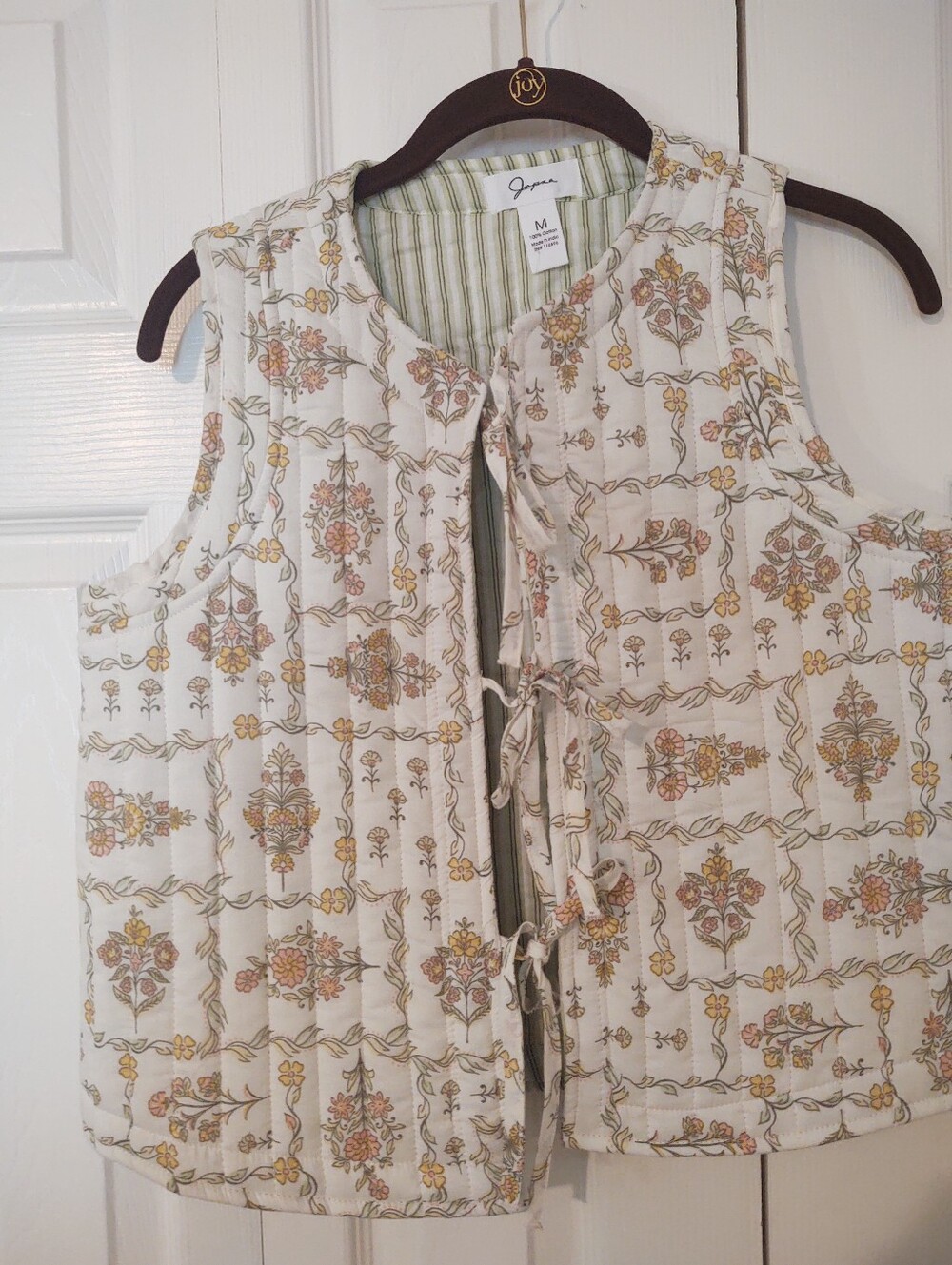 Japna quilted floral tie-front vest